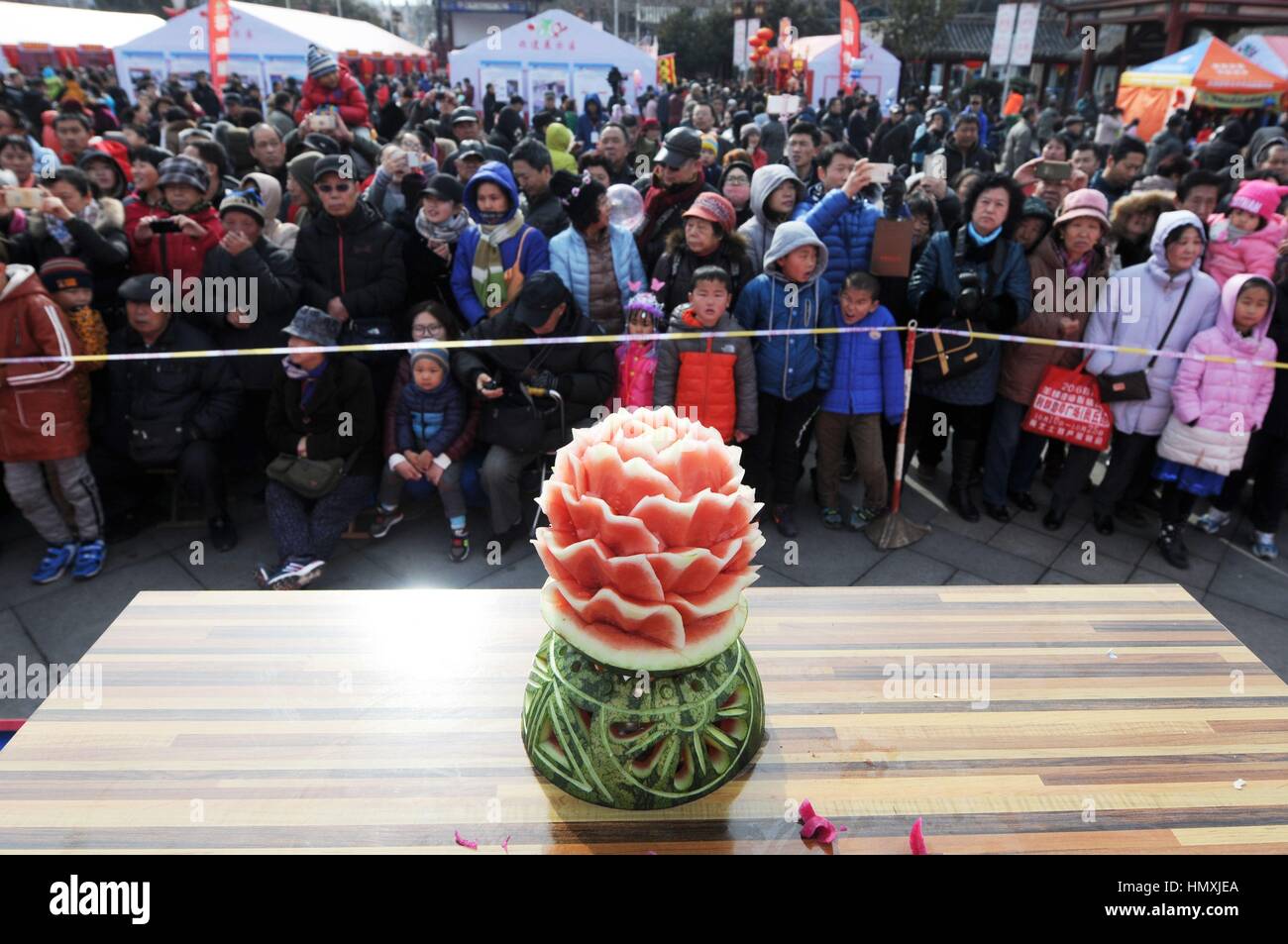 China. 6th Feb, 2017.A carrot carving competition is held at a temple ...