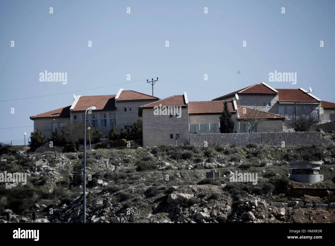 Hebron. 7th Feb, 2017. A picture shows a view of the Hagai Jewish settlement on the outskirts of the West Bank city of Hebron on Feb. 7, 2017. Israel's parliament passed Monday a controversial law to retroactively legalize wildcat Jewish outposts built on private Palestinian lands, despite international condemnations and warnings that the law is unconstitutional. Credit: Mamoun Wazwaz/Xinhua/Alamy Live News Stock Photo