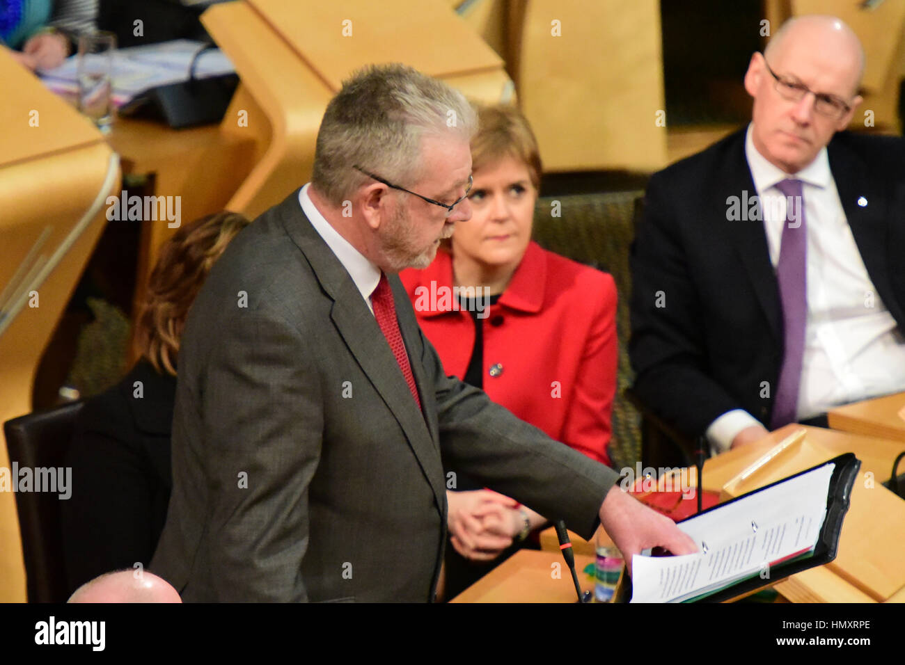 Edinburgh, UK. 7th Feb, 2017. Scottish Brexit Minister Michael Russell (L)introduces a Scottish Government debate in the Scottish Parliament opposing the triggering of Article 50, as First Minister Nicola Sturgeon looks on, Credit: Ken Jack/Alamy Live News Stock Photo