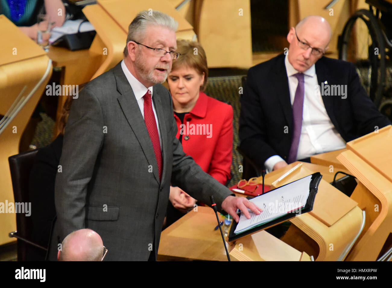 Edinburgh, UK. 7th Feb, 2017. Scottish Brexit Minister Michael Russell (L)introduces a Scottish Government debate in the Scottish Parliament opposing the triggering of Article 50, as First Minister Nicola Sturgeon looks on, Credit: Ken Jack/Alamy Live News Stock Photo