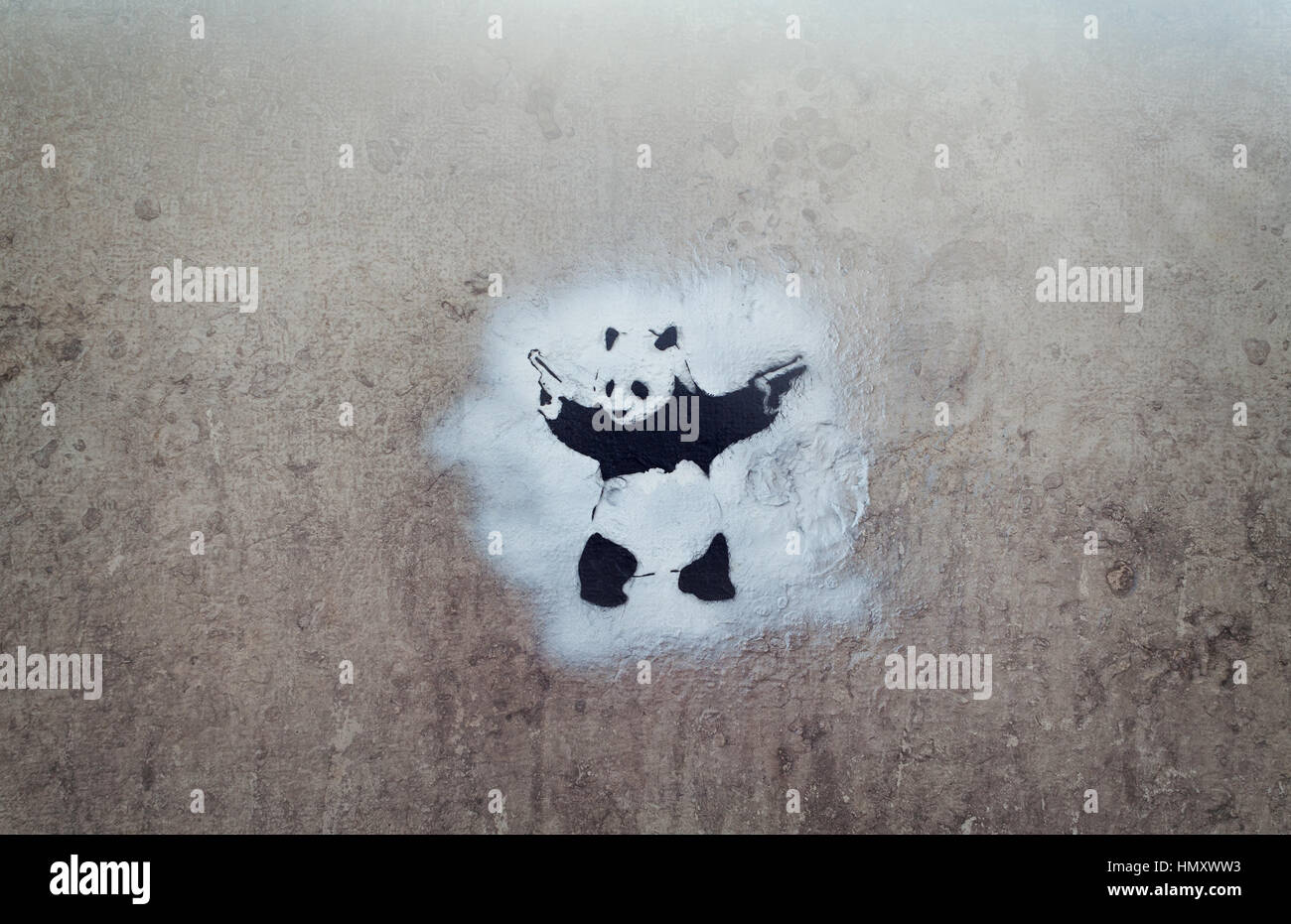 Panda with two guns Stock Photo