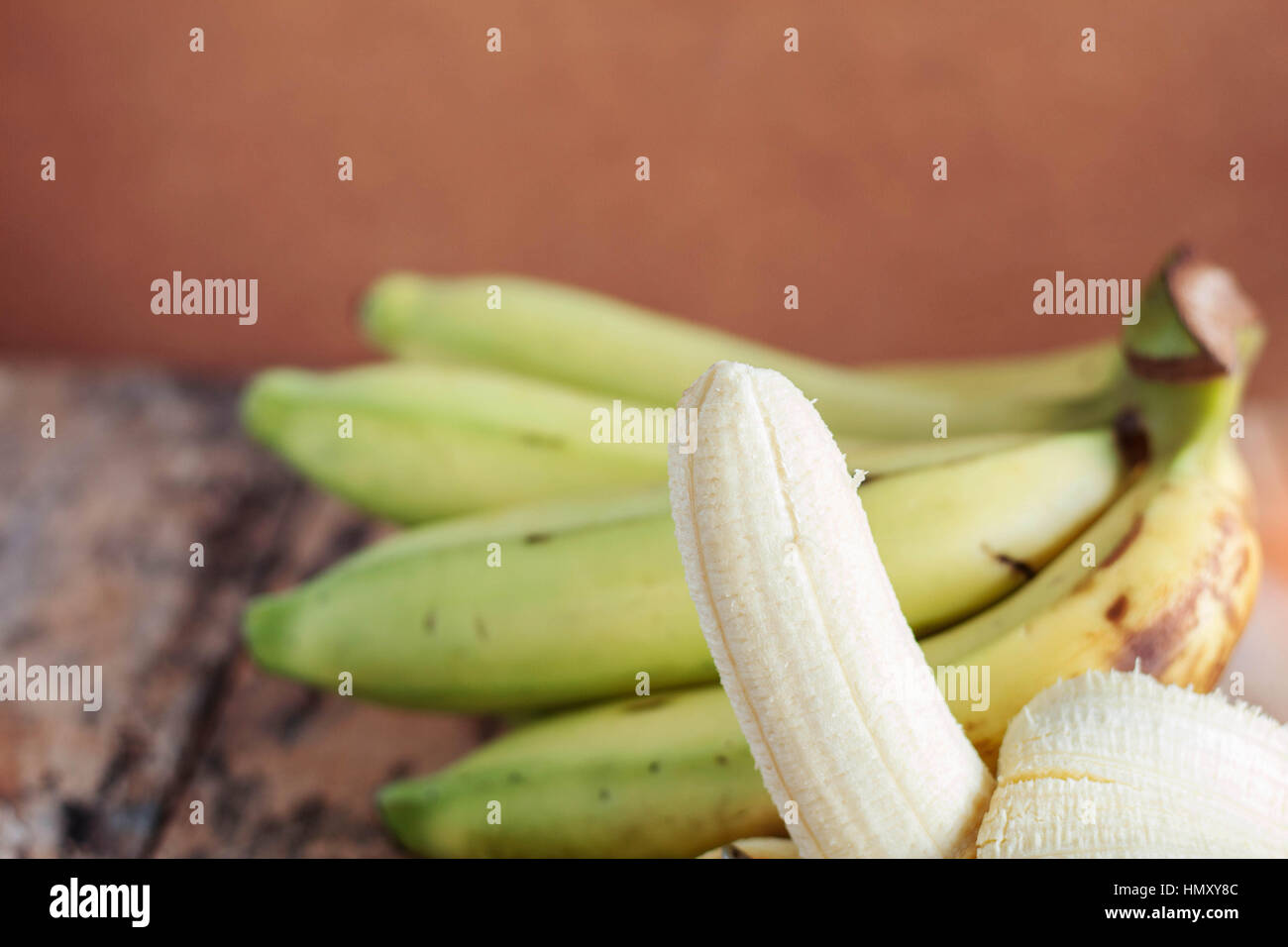 Banana peel on the old wooden floor. Stock Photo