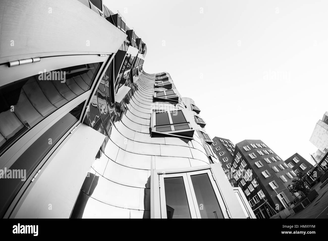 DUESSELDORF, GERMANY - JANUARY 22, 2017: The famous Chrome-Building in the New Media Harbor taken by a Fish Eye Camera in Black & White Stock Photo
