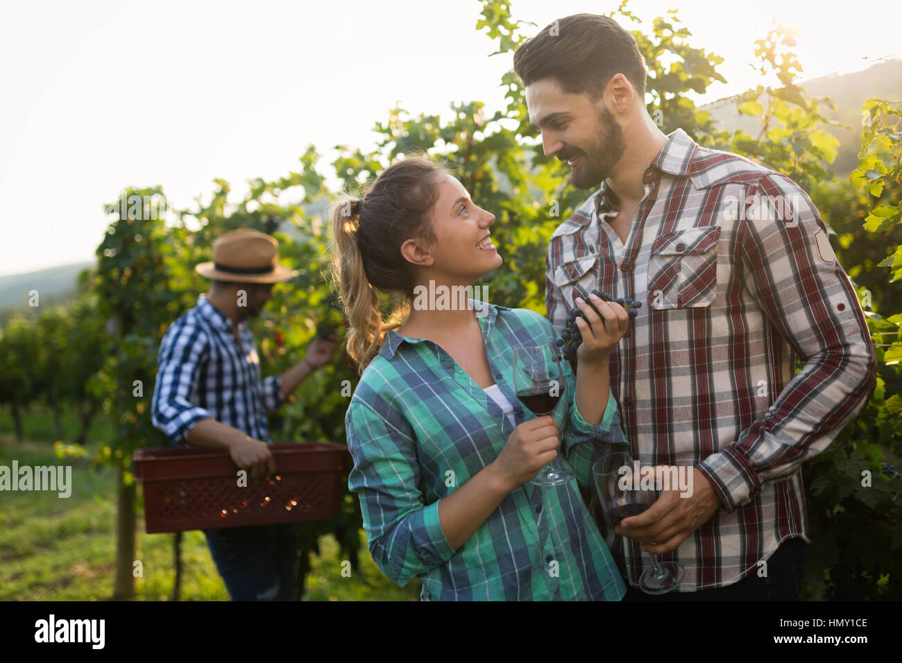 People sampling and tasting wines in winegrowers  vineyard Stock Photo