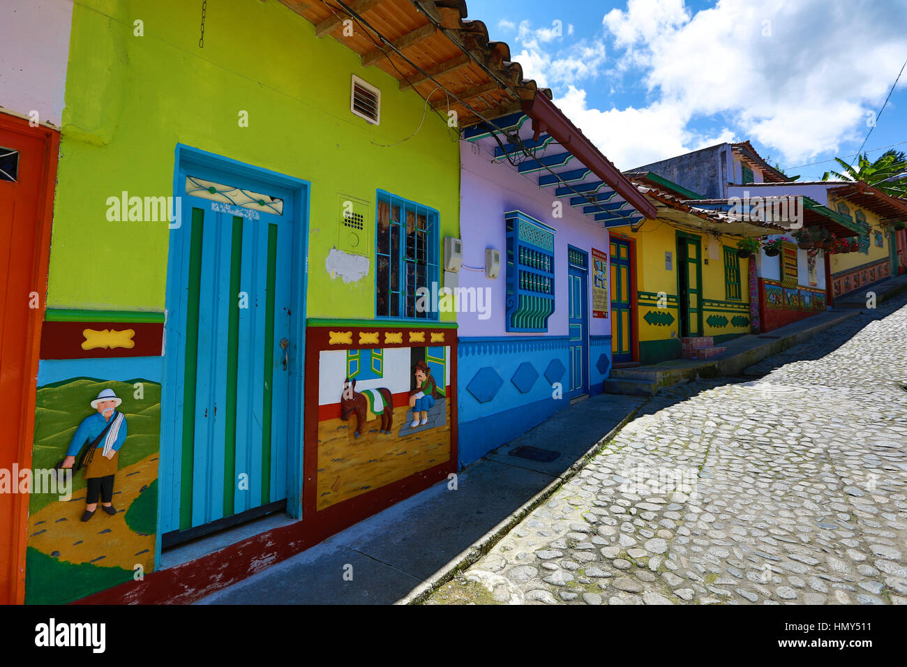 colorful colonial houses and cobblestone street in Guatape Colombia Stock Photo