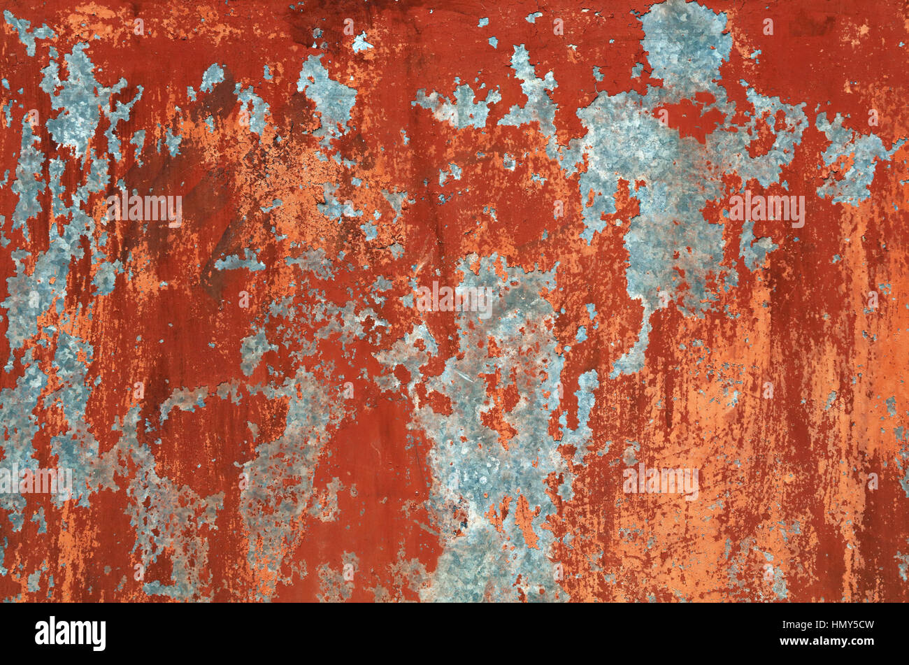 Grunge red and brown old painted wall background texture with stains of