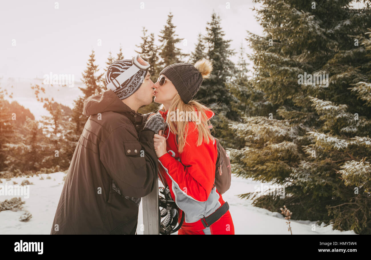 Loving couple on skiing Stock Photo
