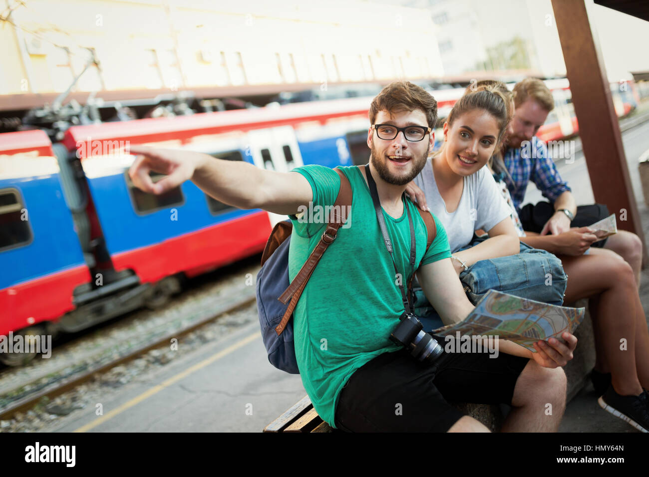 Young tourists travelling by train and discovering world Stock Photo