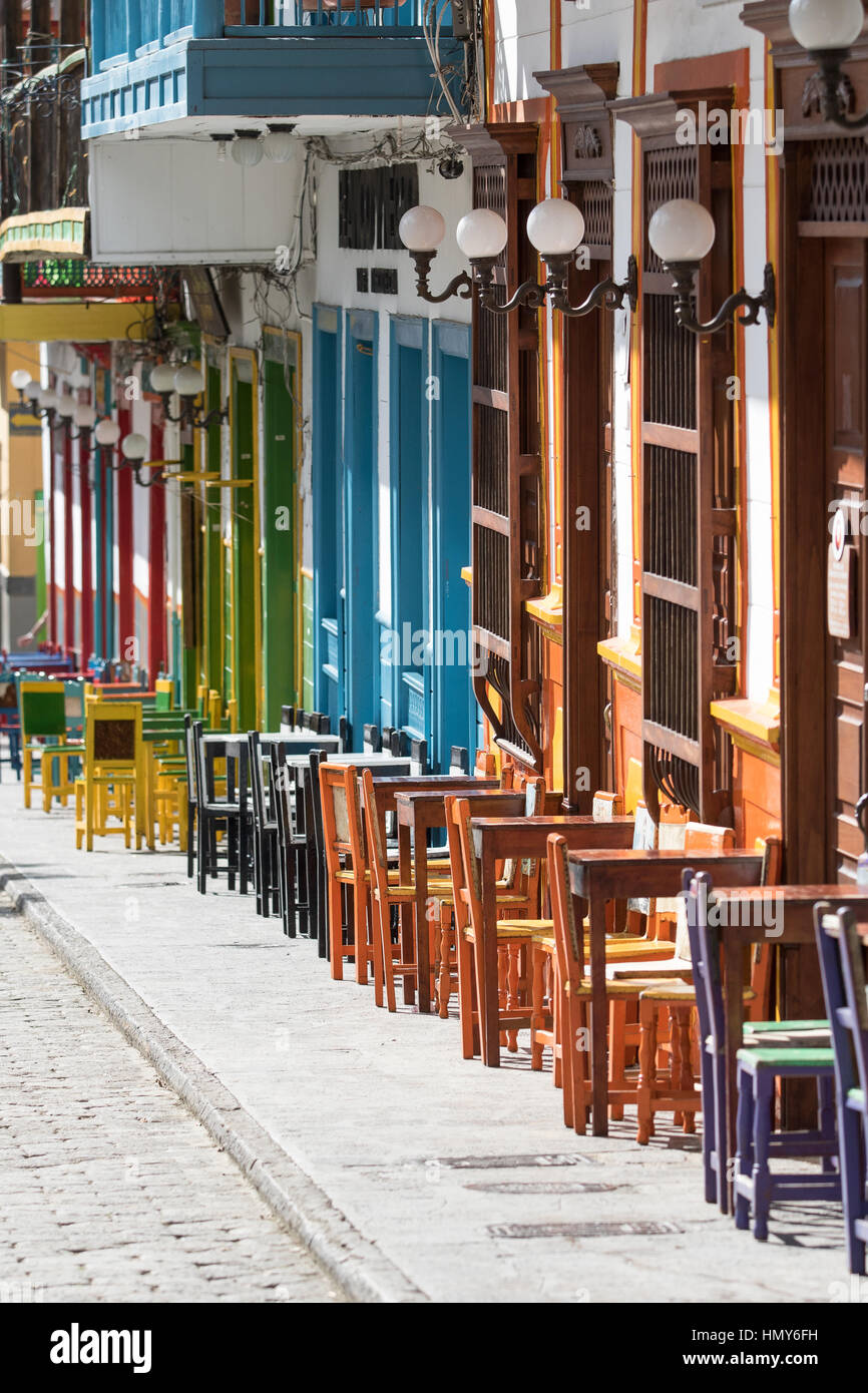 Street café patio tables and chairs in El Jardin Colombia Stock Photo