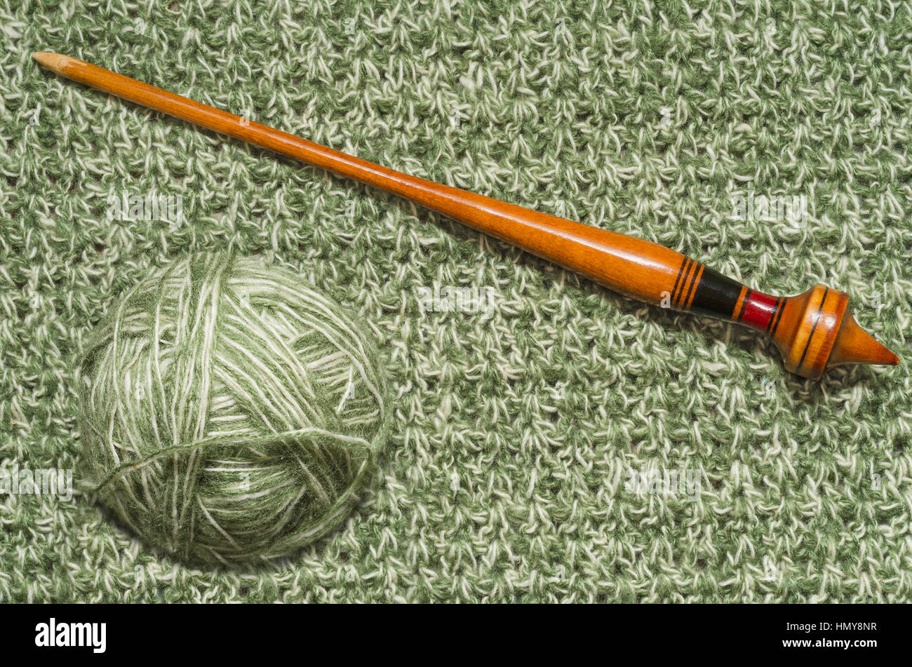 The ball of yarn on a background of knitted fabrics Stock Photo Alamy