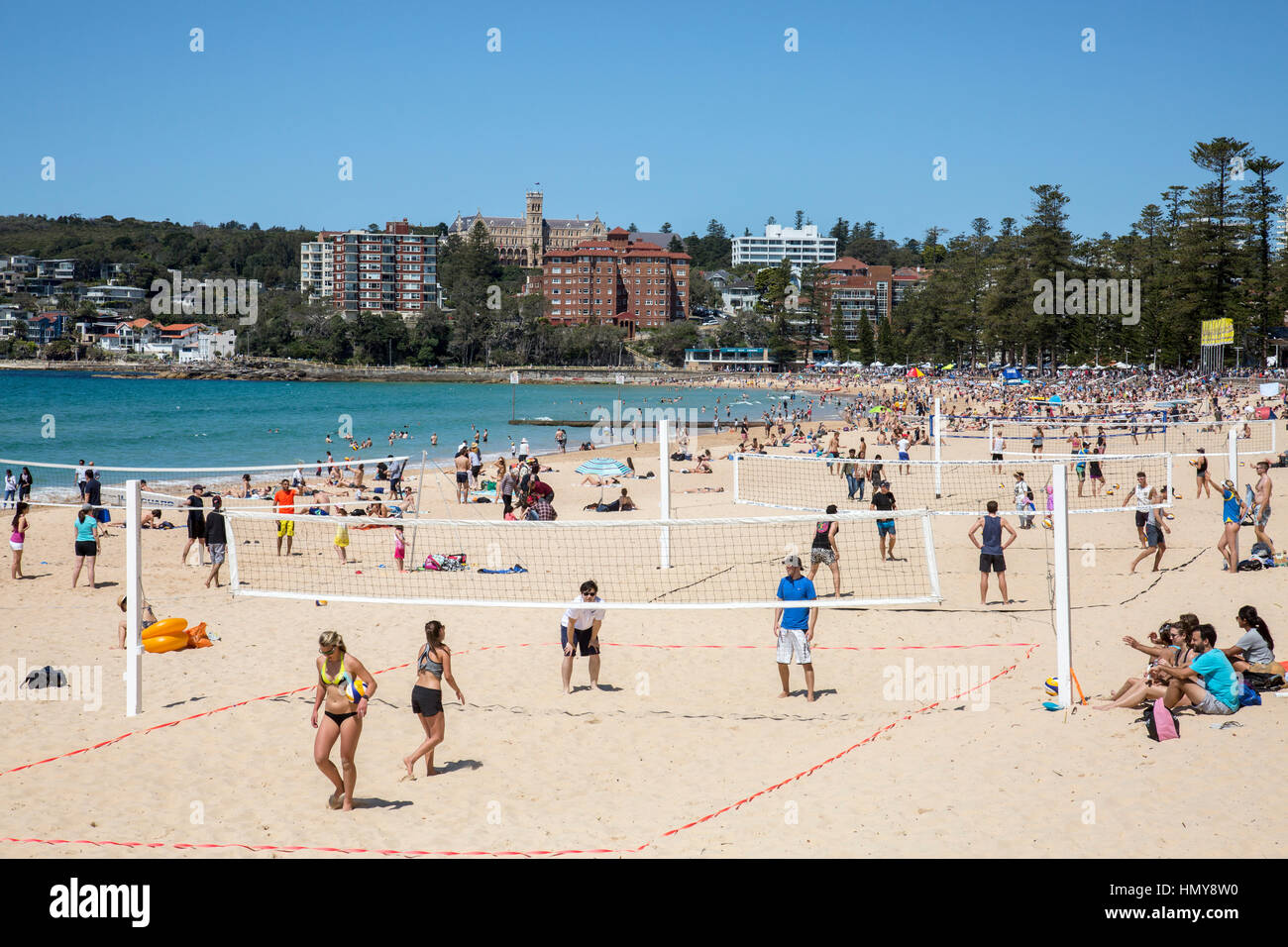 Playing beach volleyball on Manly Beach, one of Sydney's popular coastal beaches, New South Wales,Australia Stock Photo