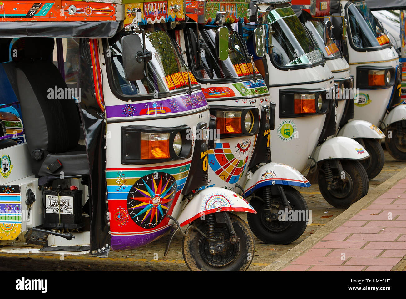 November 12, 2016 Guatape, Colombia: small three wheeled motorized taxis  called motochivas waiting for customers in the popular tourist town Stock  Photo - Alamy