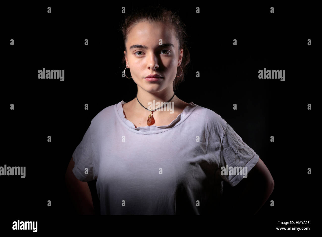 portrait of a beautiful woman with black background Stock Photo - Alamy