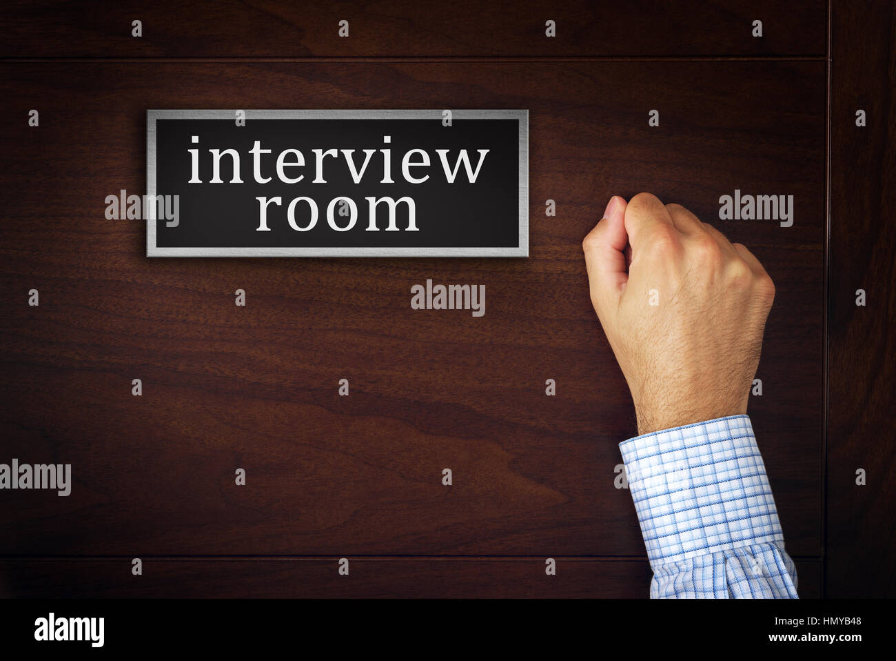 Businessman knocking on interview room door, man applying for a job, career opportunity concept Stock Photo