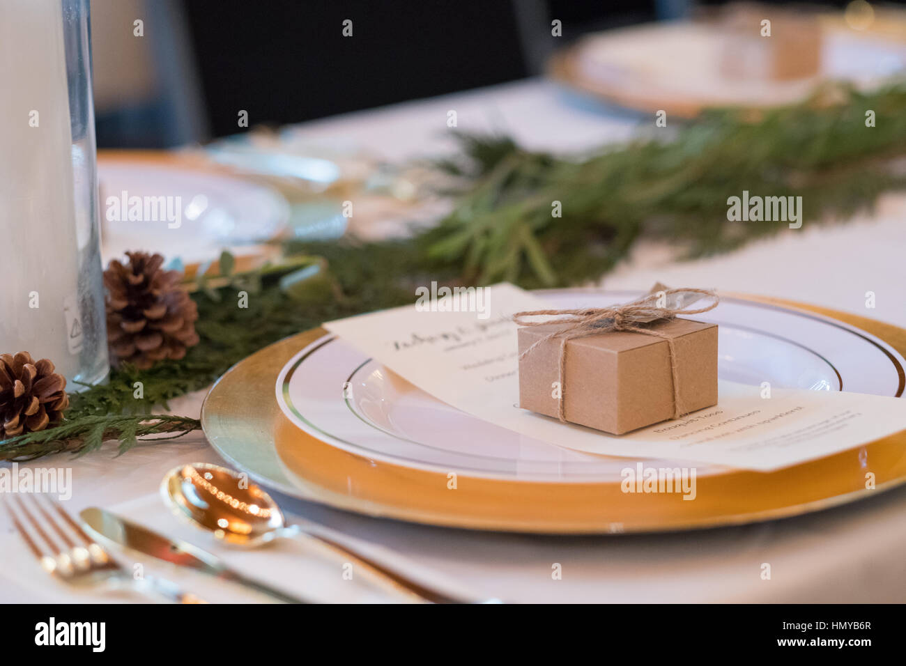 Wedding Reception Tables With Seating Plates And Candles At A