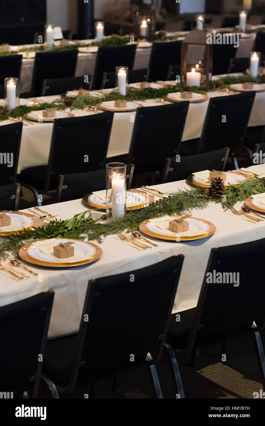 Wedding Reception Tables With Seating Plates And Candles At A