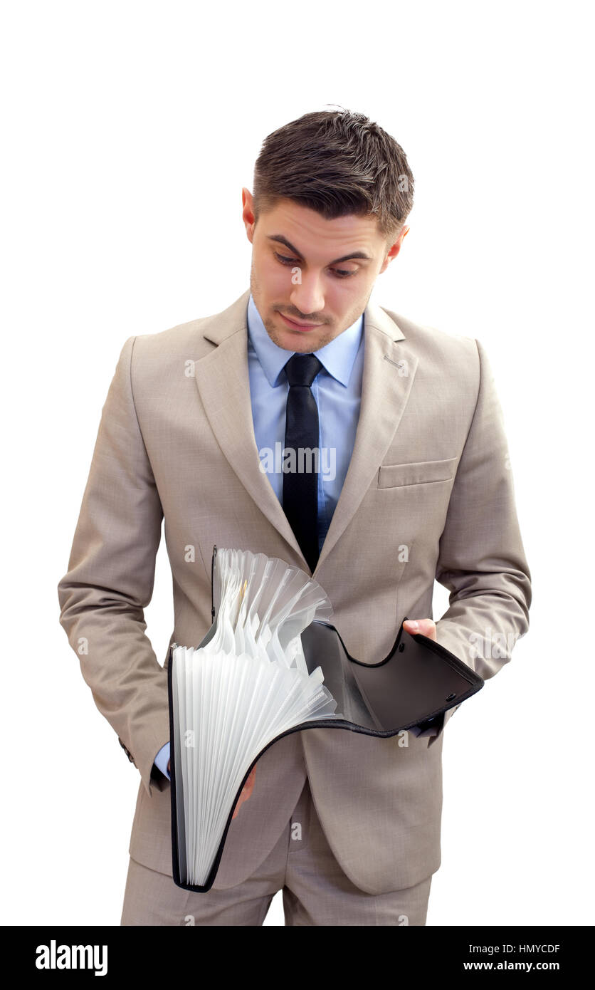 Confident businessman is checking out the documents Stock Photo - Alamy