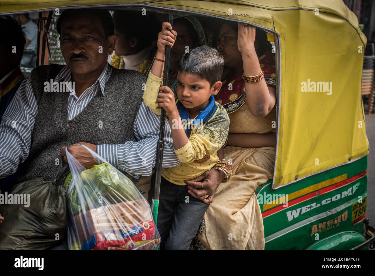 Unhappy boy, tuk tuk passenger Stock Photo