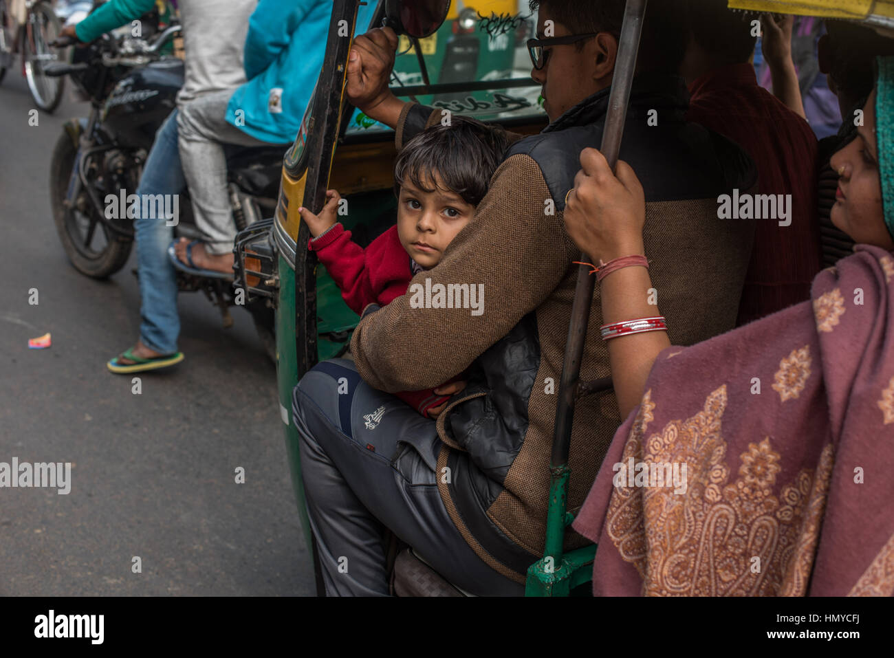 Young boy looking at camera from tuk tuk Stock Photo