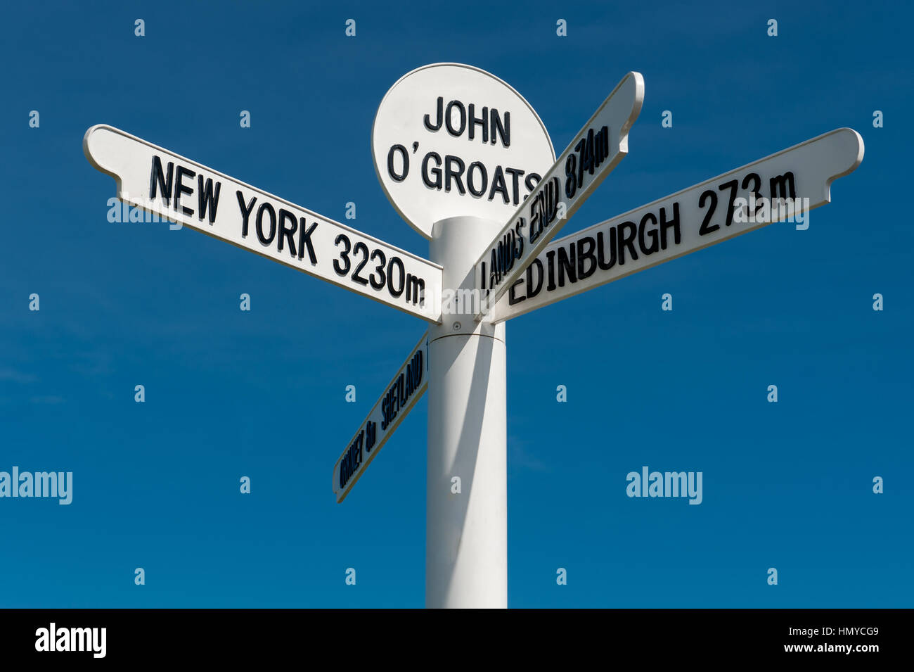 The milepost sign at John O Groats near Caithness in Scotland on the most north eastern tip of the UK. Stock Photo