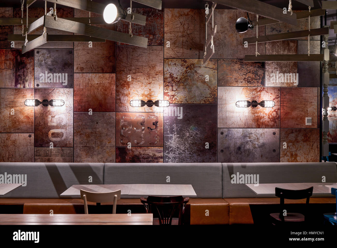 Restaurant Section Showing Bench Seats And Feature Wall And