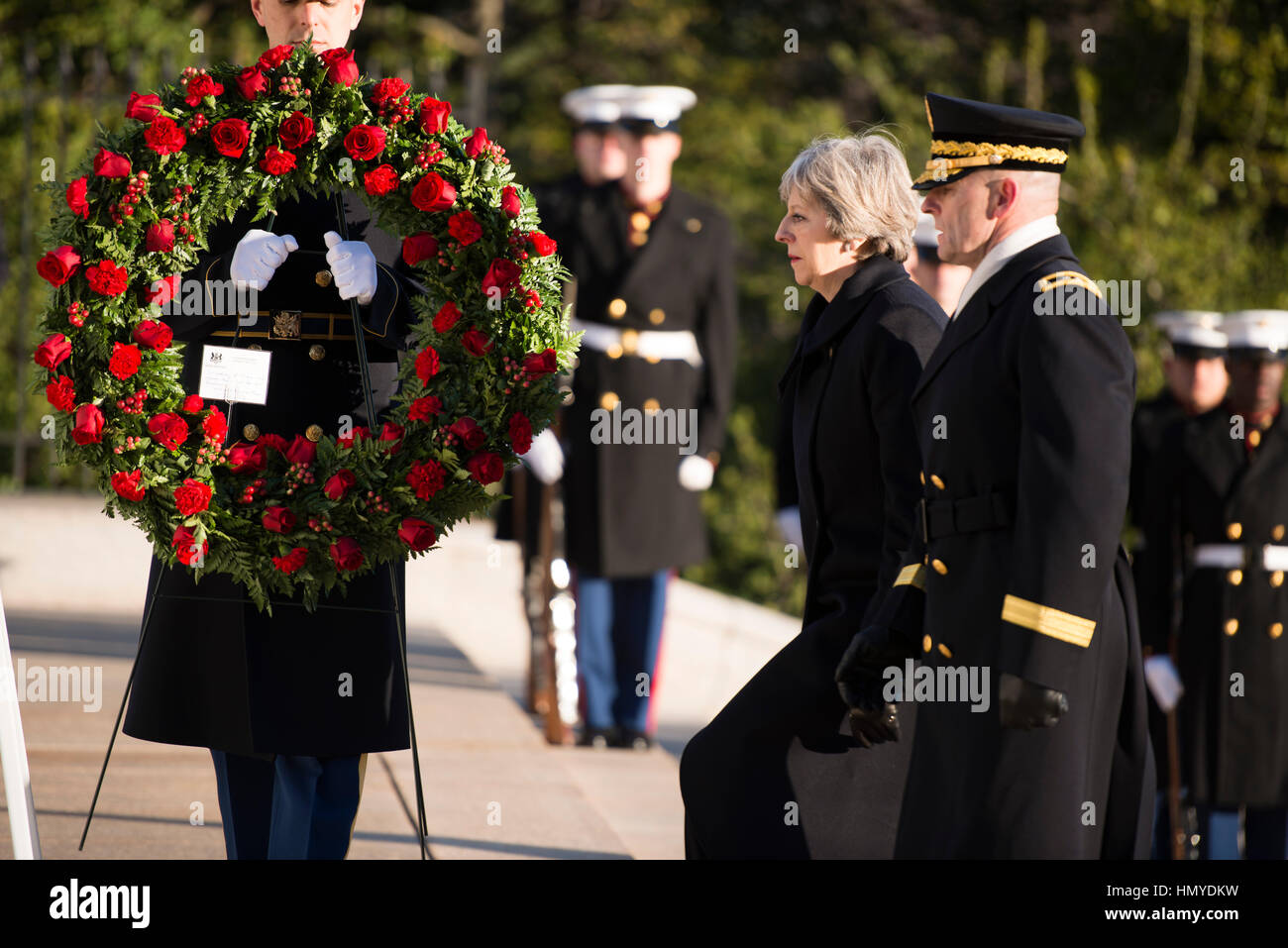 U.S. Army Commanding General Bradley Becker escorts British Prime Minister Theresa May to the Tomb of the Unknown Soldier during a wreath laying ceremony at the Arlington National Cemetery January 27, 2017 in Arlington, Virginia. Stock Photo