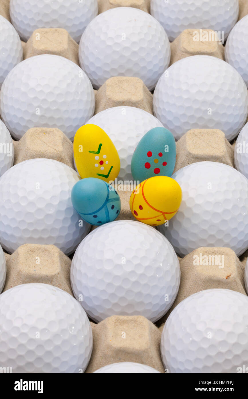 White golf balls in the box for eggs and Easter decoration Stock Photo