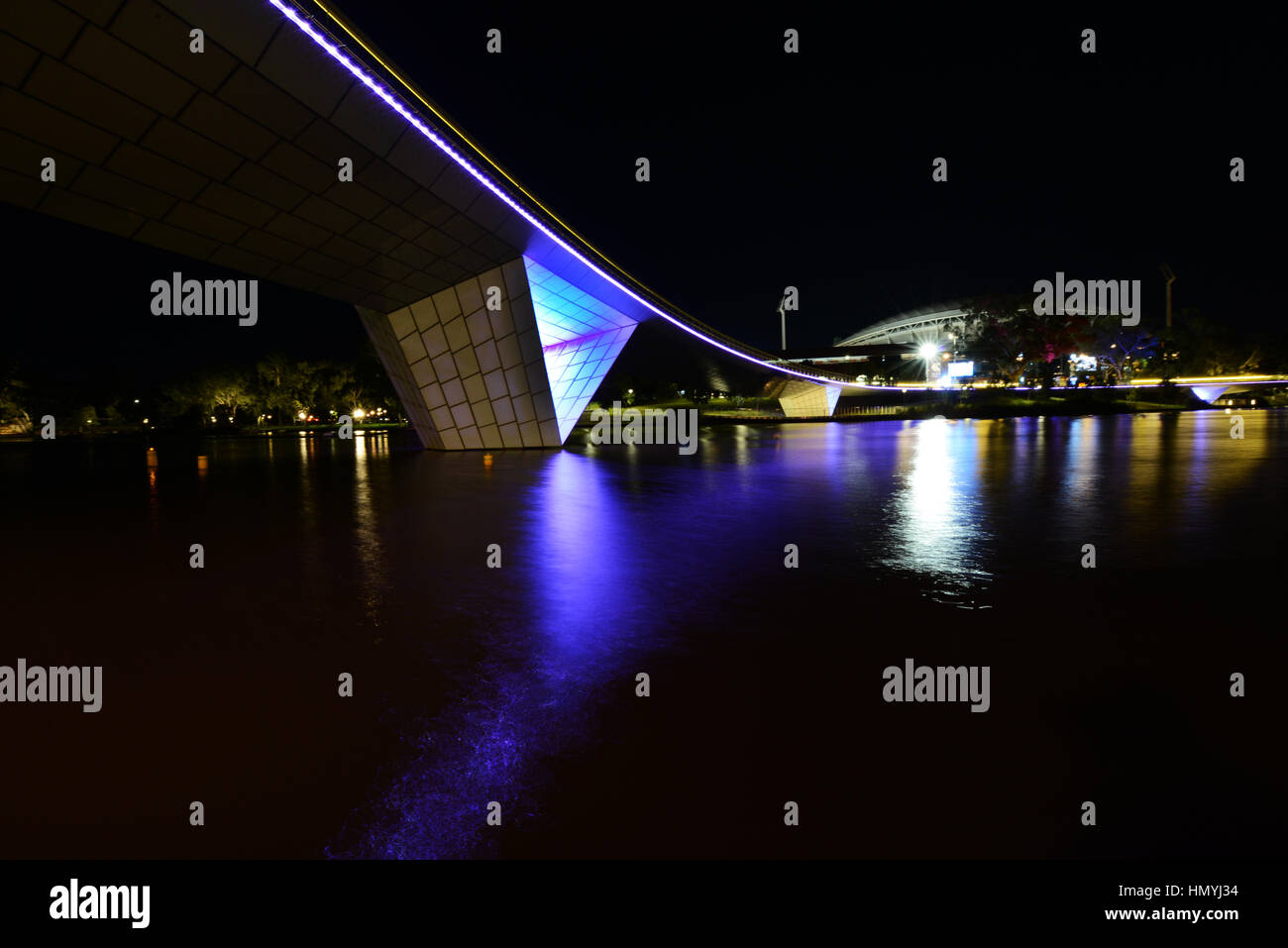 The unique footbridge connecting The Oval stadium and the opposite side of the river Torrens. Stock Photo