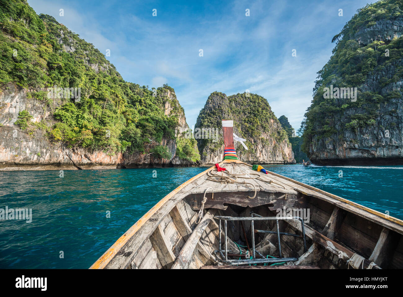 Traditional longtail boat in pile bay on Koh Phi Phi Leh Island, Krabi, Southern of Thailand Stock Photo