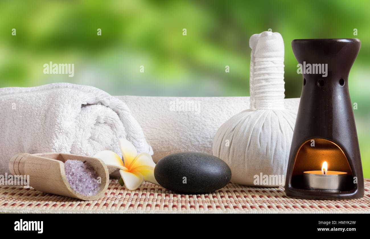 spa still life with candle and zen stone Stock Photo