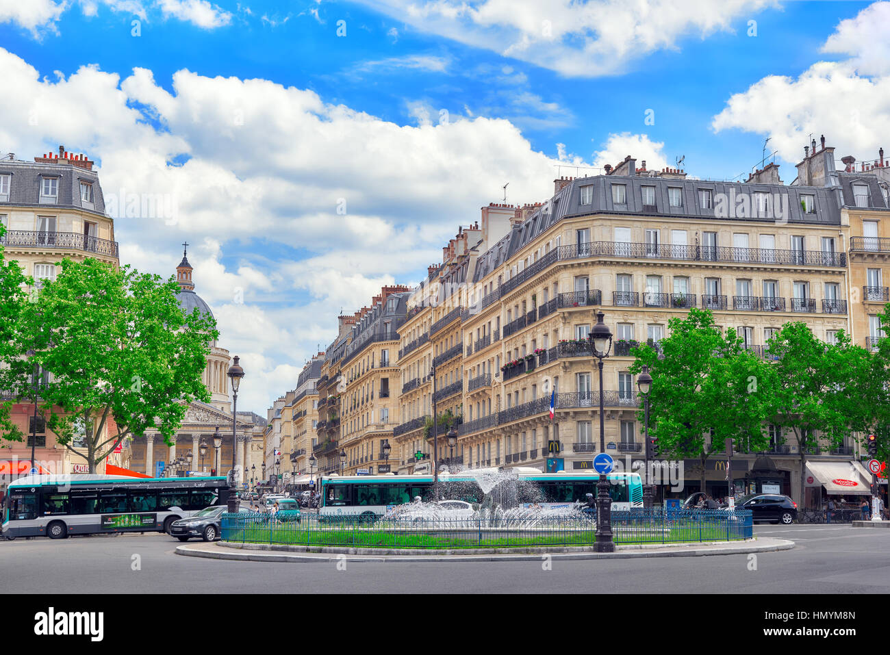 PARIS, FRANCE - JULY 08, 2016 : Fontaine Rostand near Luxembourg Palase and street view with people on them in Paris. Stock Photo