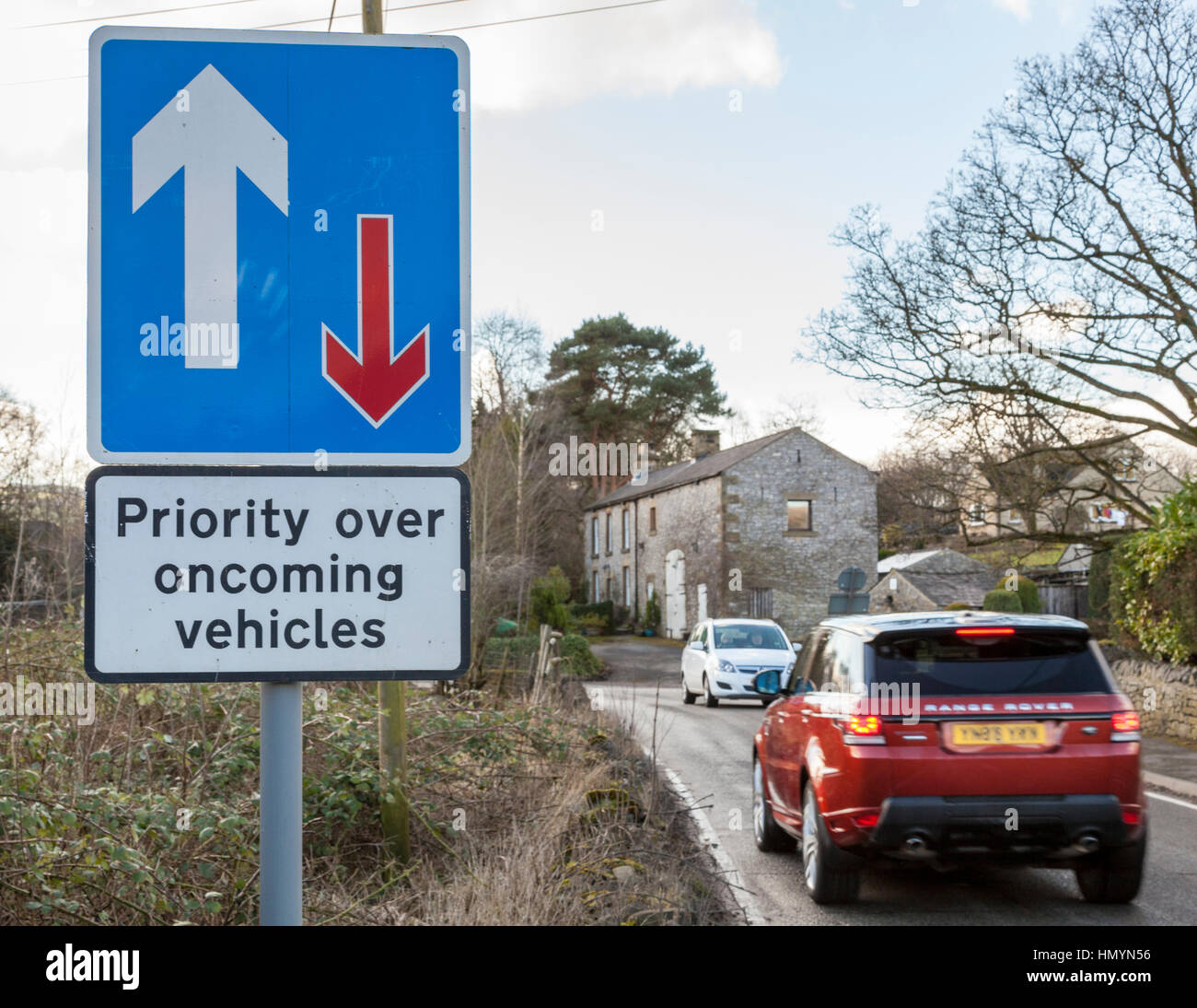 Priority over oncoming vehicles road sign, Brough, Derbyshire. England, UK Stock Photo