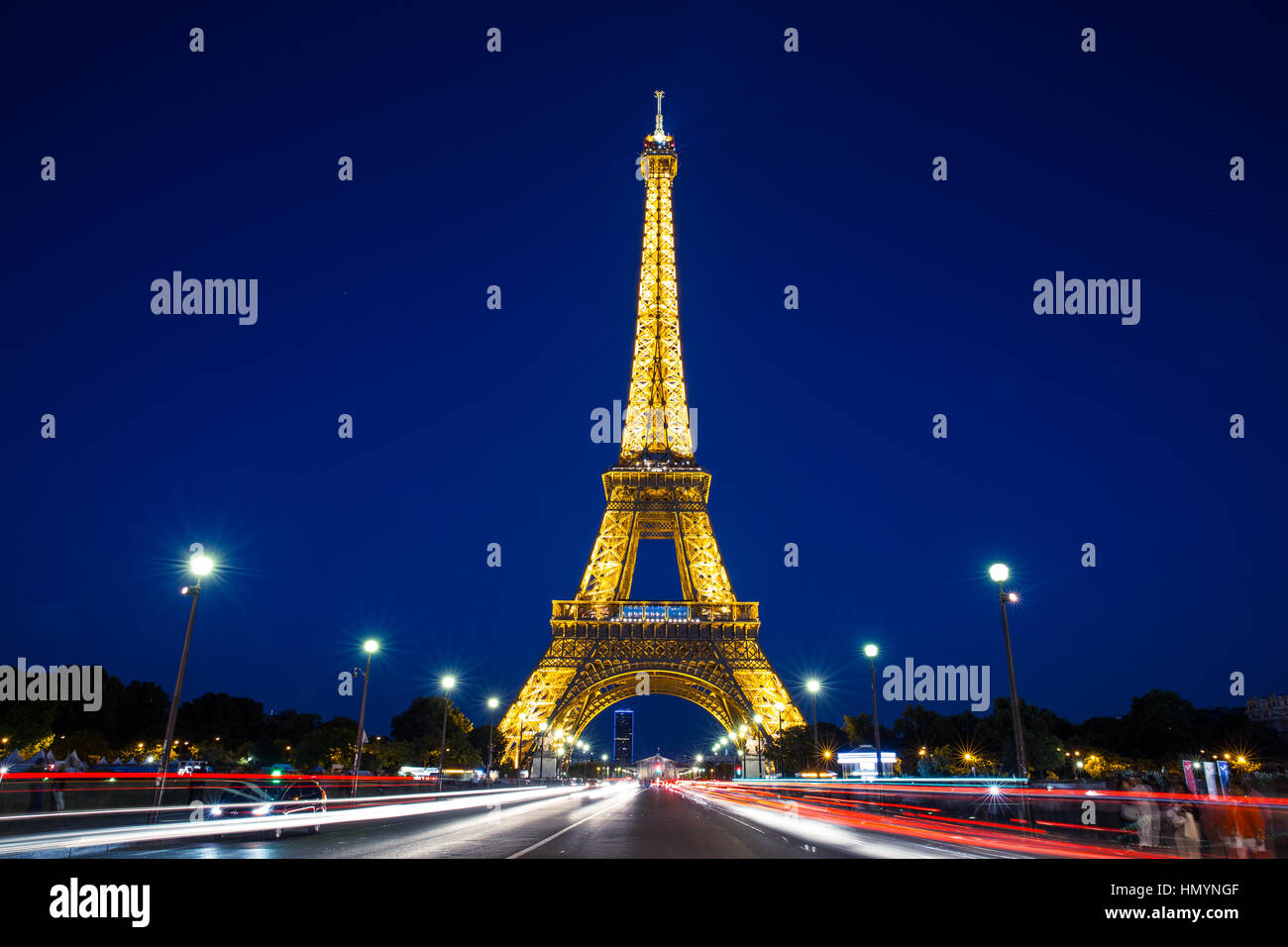 Eiffel Tower in Paris at night Stock Photo