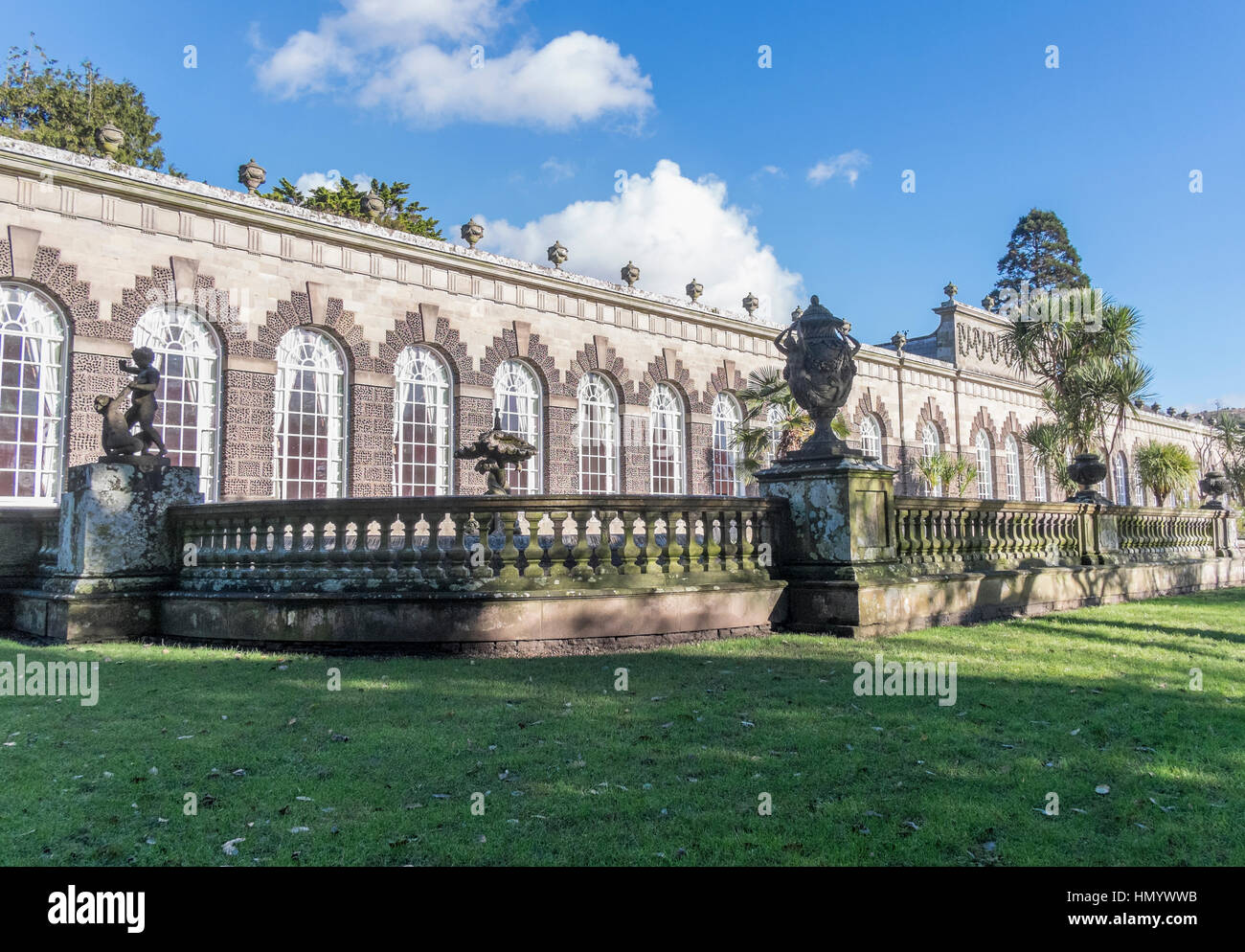 The orangery is a pavilion housing a large collection of orange lemon and citrus trees being part of the Margam Park Estate. Stock Photo