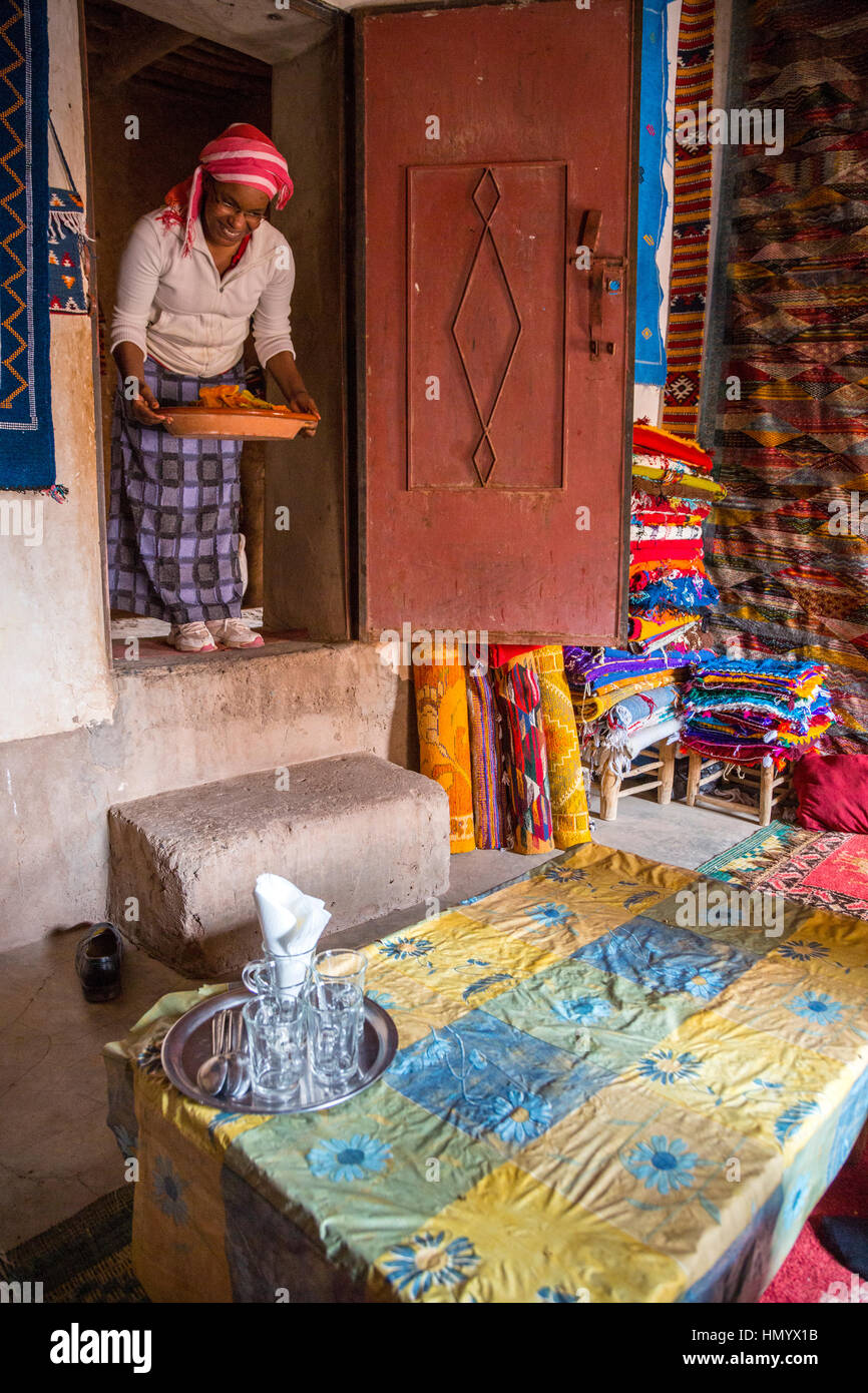 Morocco. Woman of AfricanBerber Ethnicity Bringing Couscous to the