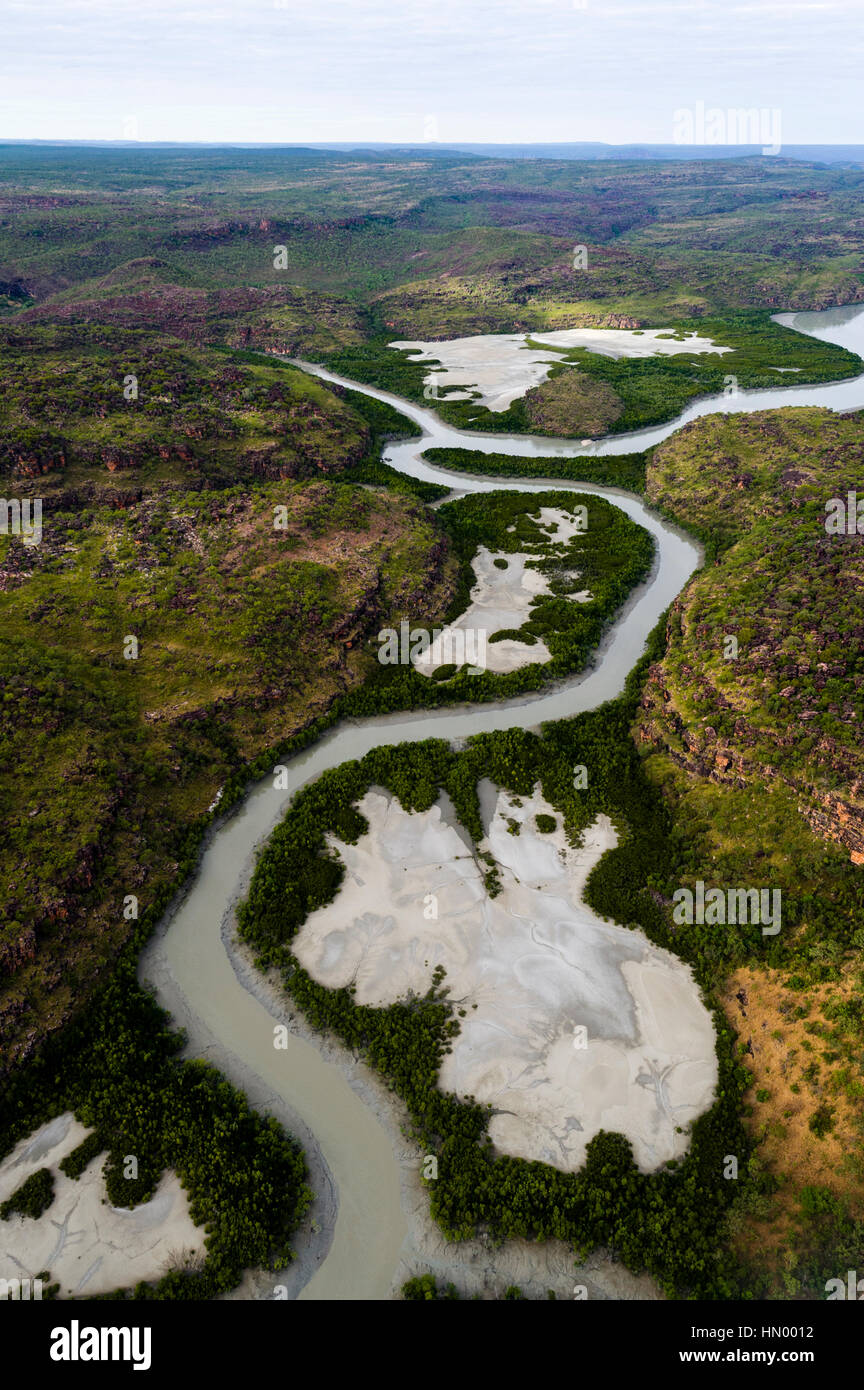 An aerial view of river tidal inlets winding their way through mangrove forests. Stock Photo