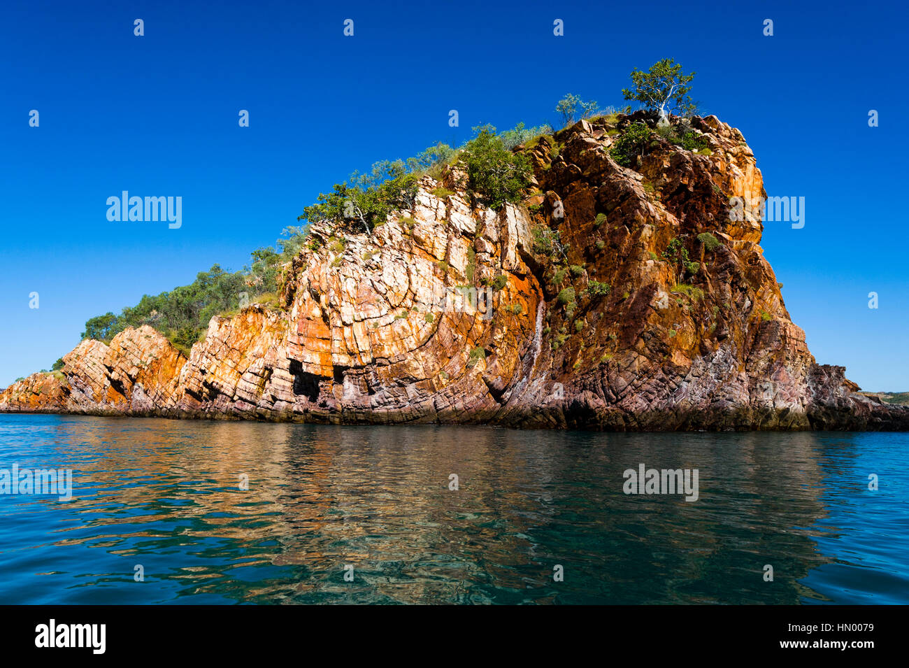 A series of sandstone synclines where folds in the rock happen under pressure. Stock Photo