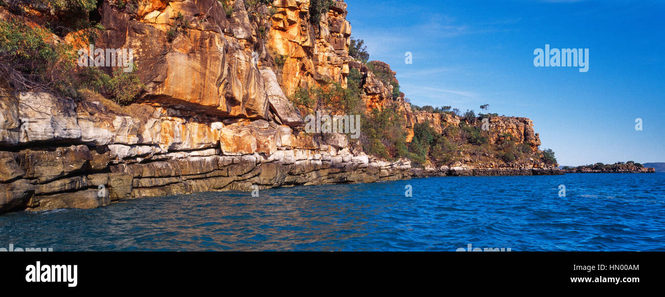 A high tide mark along a rugged sandstone cliff in the Kimberley. Stock Photo