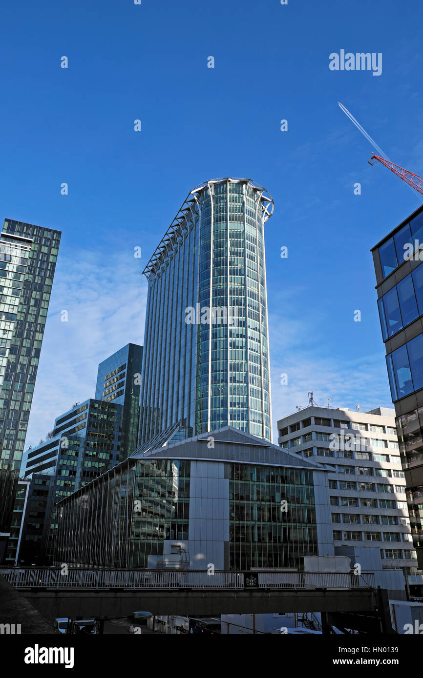 A view of City Point office building during adjacent building site under construction seen from Fore Street area in the City of London UK KATHY DEWITT Stock Photo