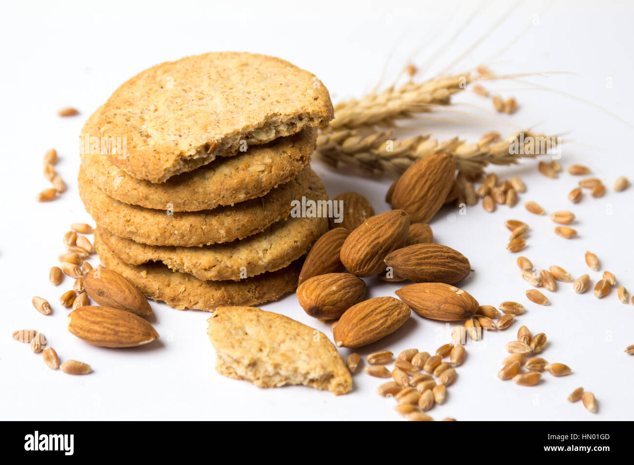 Integral cookies with almonds and linseed on white Stock Photo