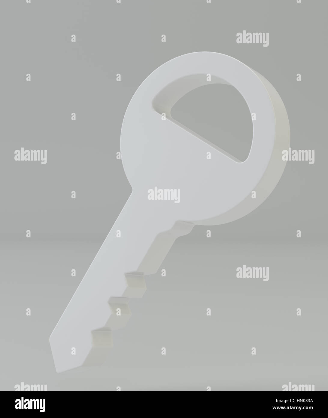 Key on gray background Stock Photo - Alamy