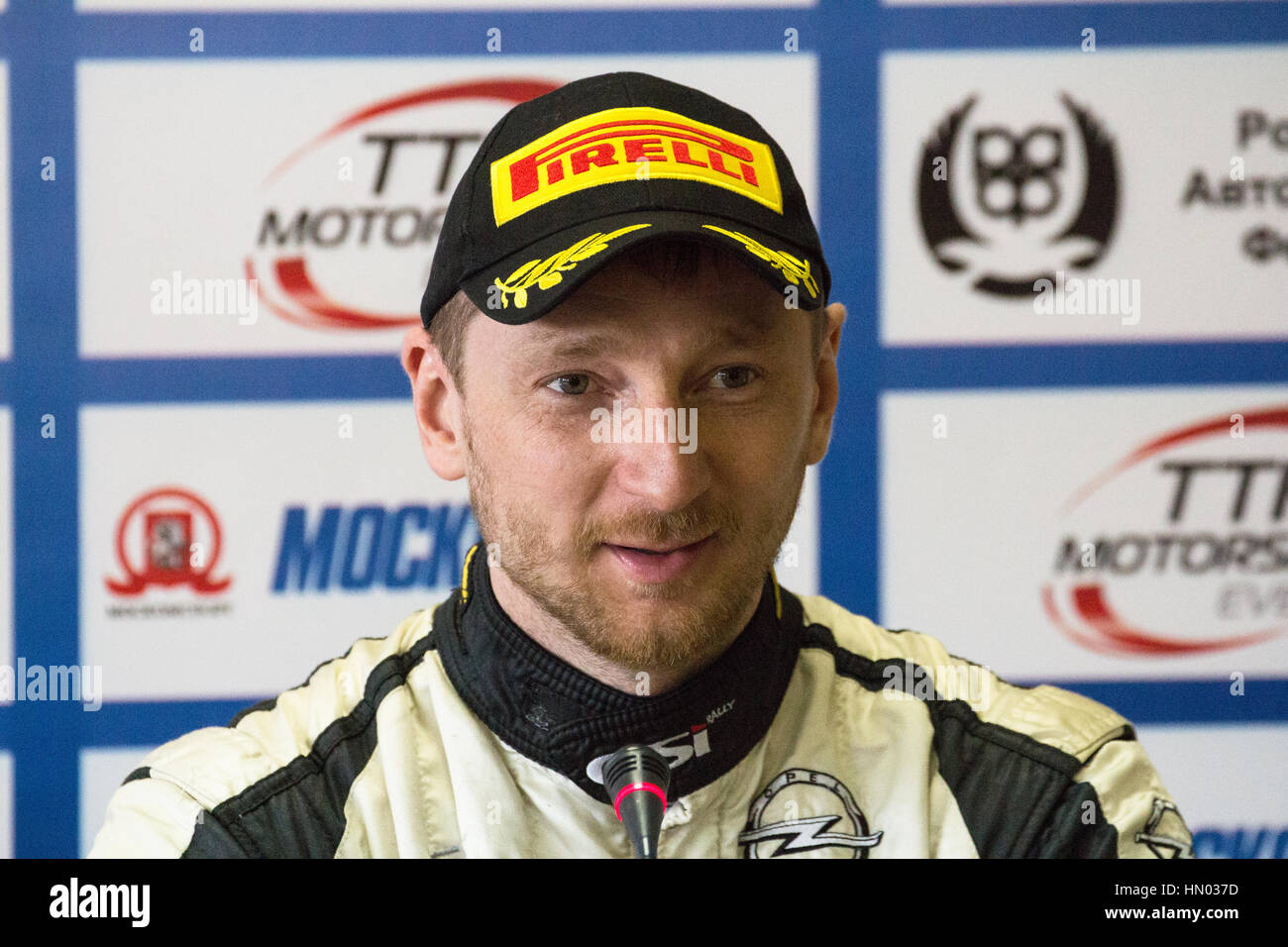 Moscow, Russia - Apr 18, 2015: Driver Lukyanuk Alexey during a press conference after the Rally Masters Show 2015. Stock Photo
