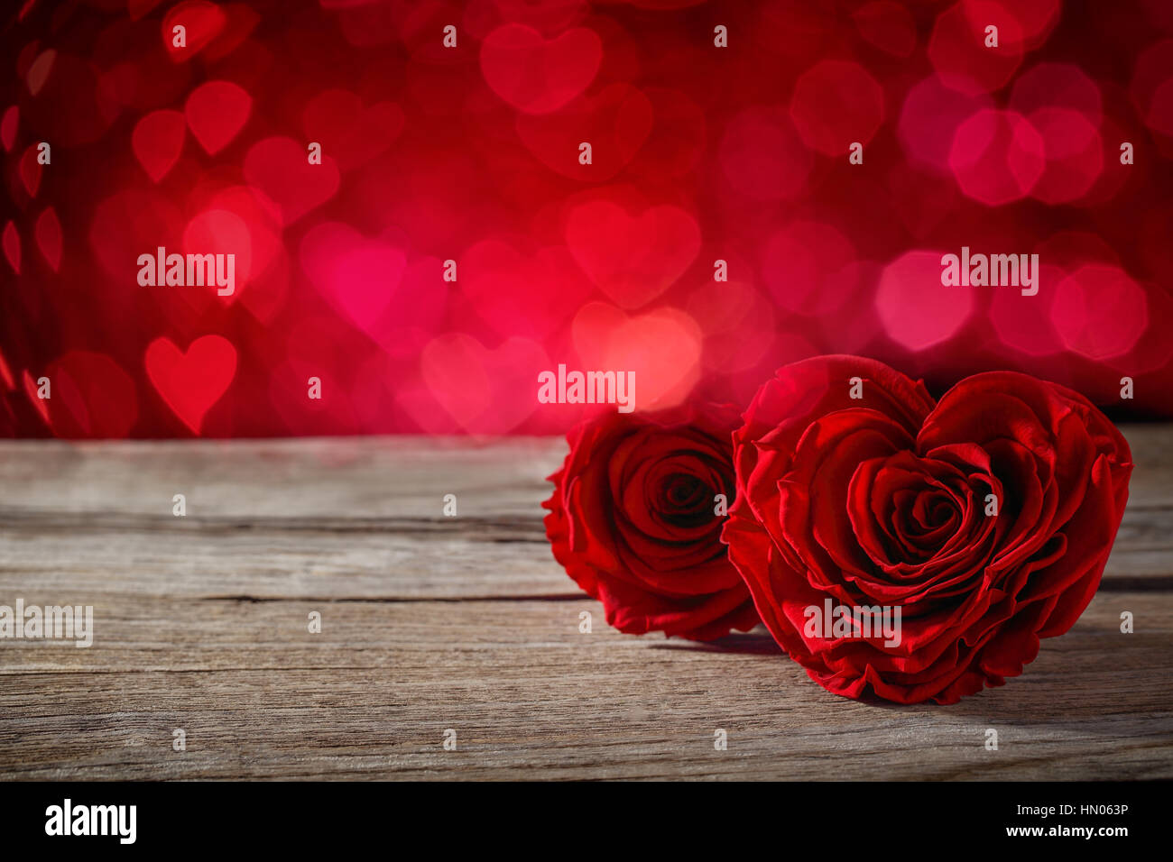 Heart shape of rose on wooden table,Valentines background Stock Photo