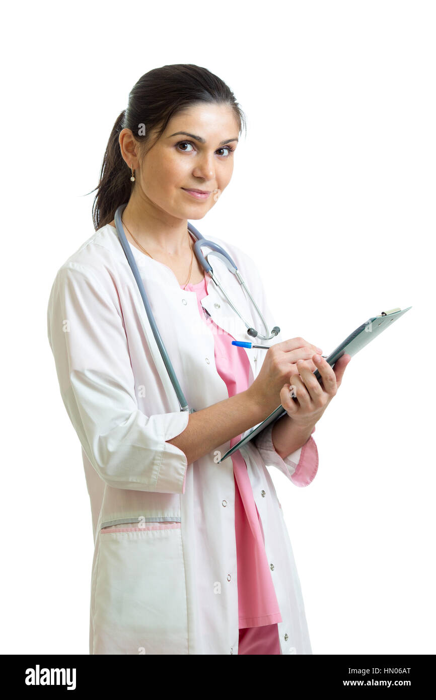 Beautiful smiling woman doctor hold pen filling patient history list at clipboard pad. Healthy lifestyle concept Stock Photo