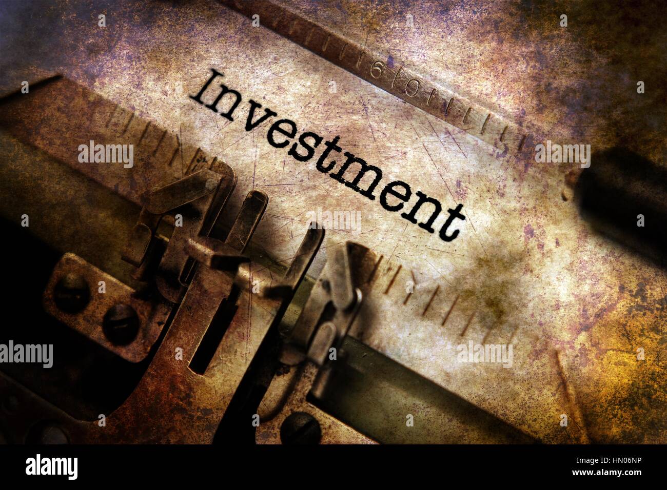 Investment text on vintage typewriter Stock Photo - Alamy