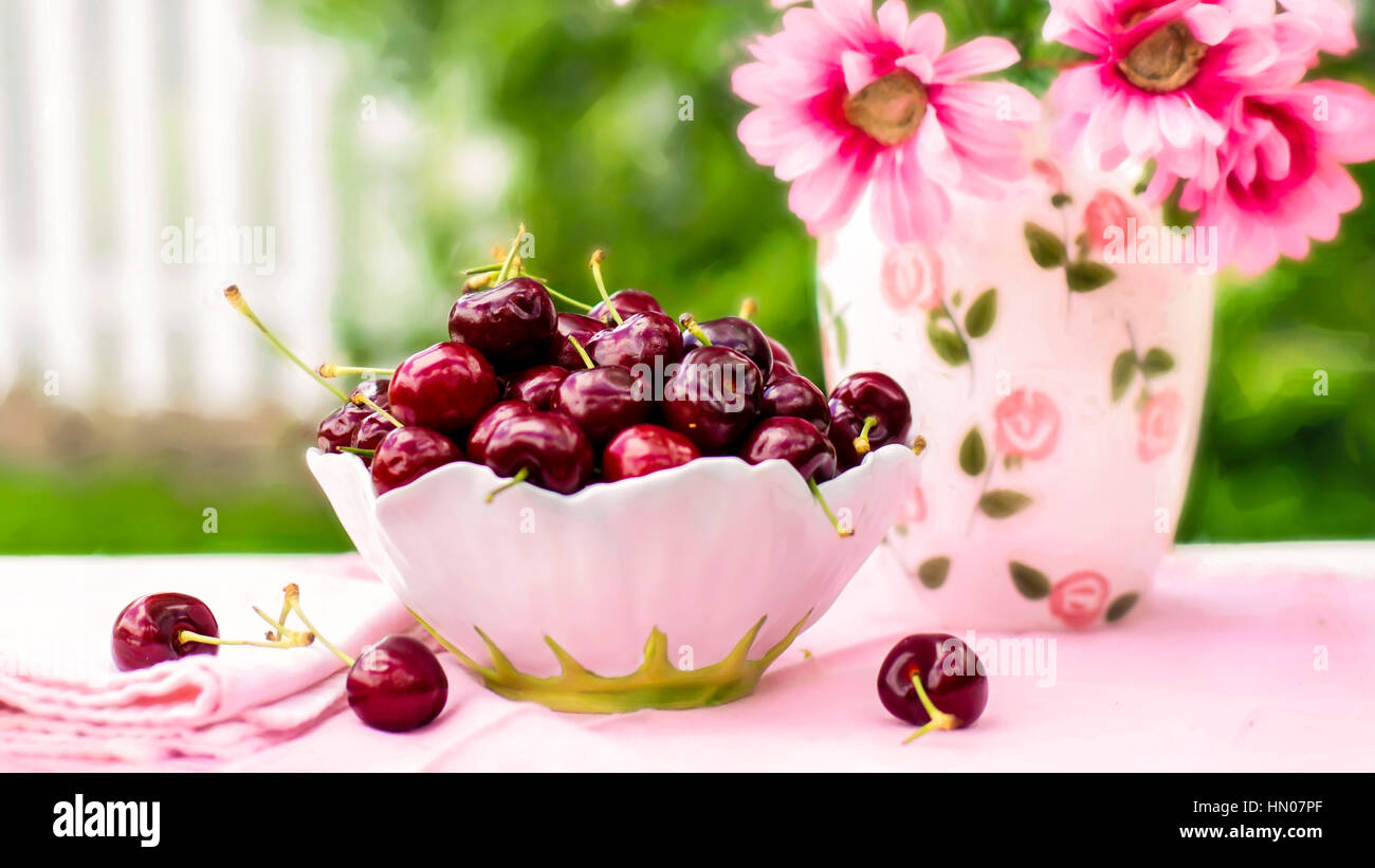 A bowl full of cherries Stock Photo