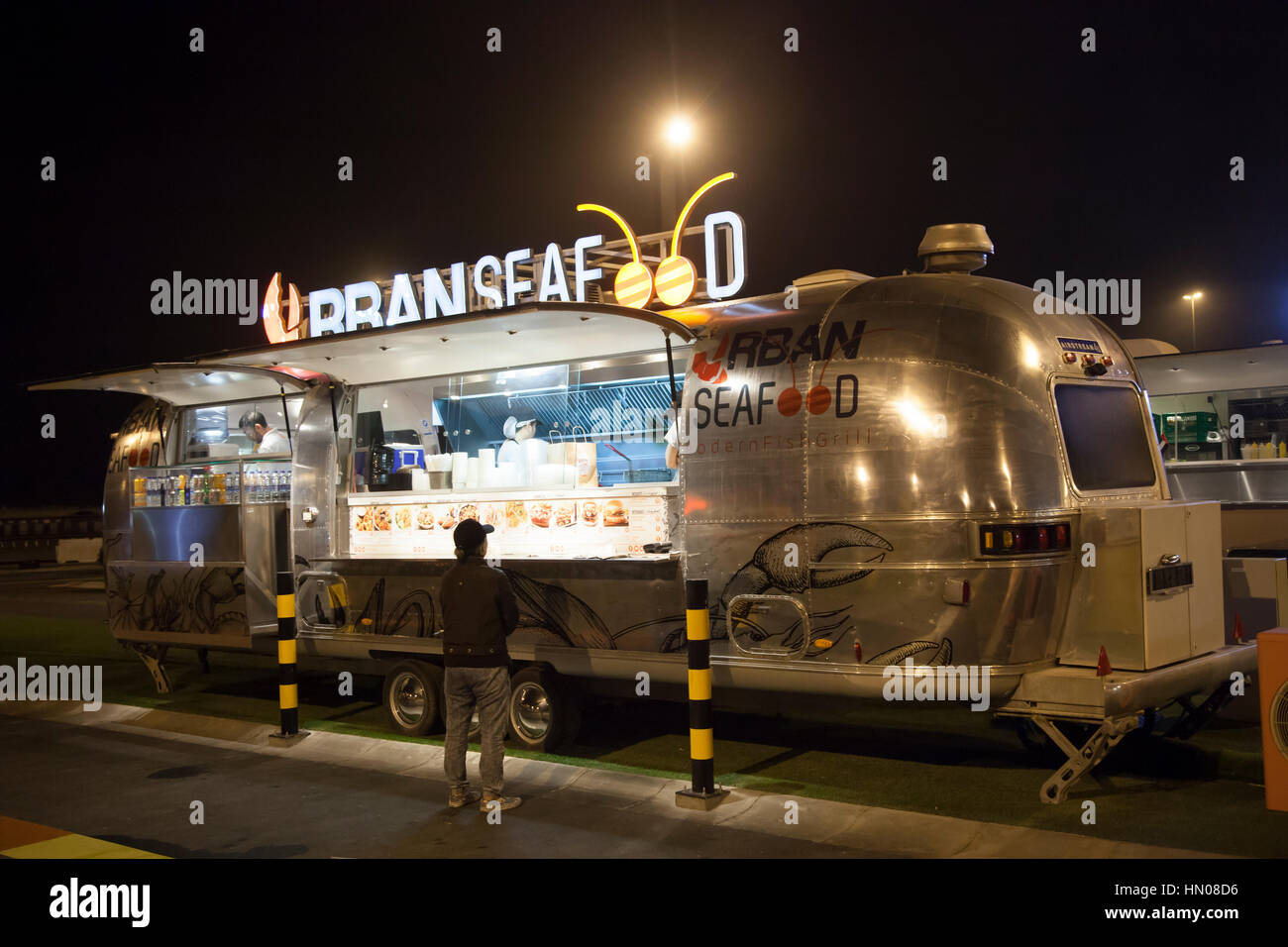 DUBAI, UAE - DEC 4, 2016: Airstream caravan food truck Urban Seafood at the Last Exit food trucks park on the E11 highway between Abu Dhabi and Dubai Stock Photo