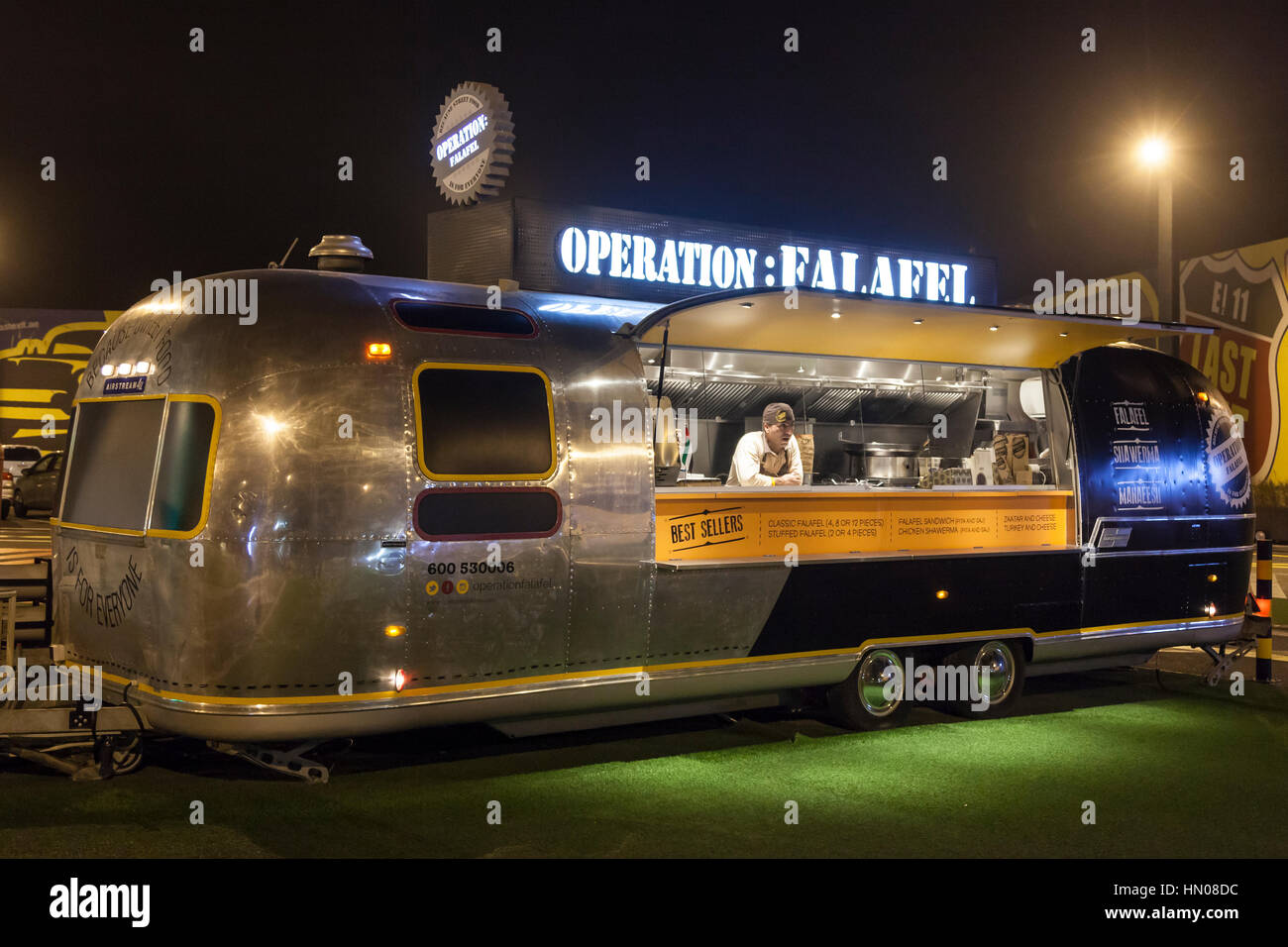 DUBAI, UAE - DEC 4, 2016: Airstream caravan Falafel food truck at the Last Exit food trucks park on the E11 highway between Abu Dhabi and Dubai Stock Photo