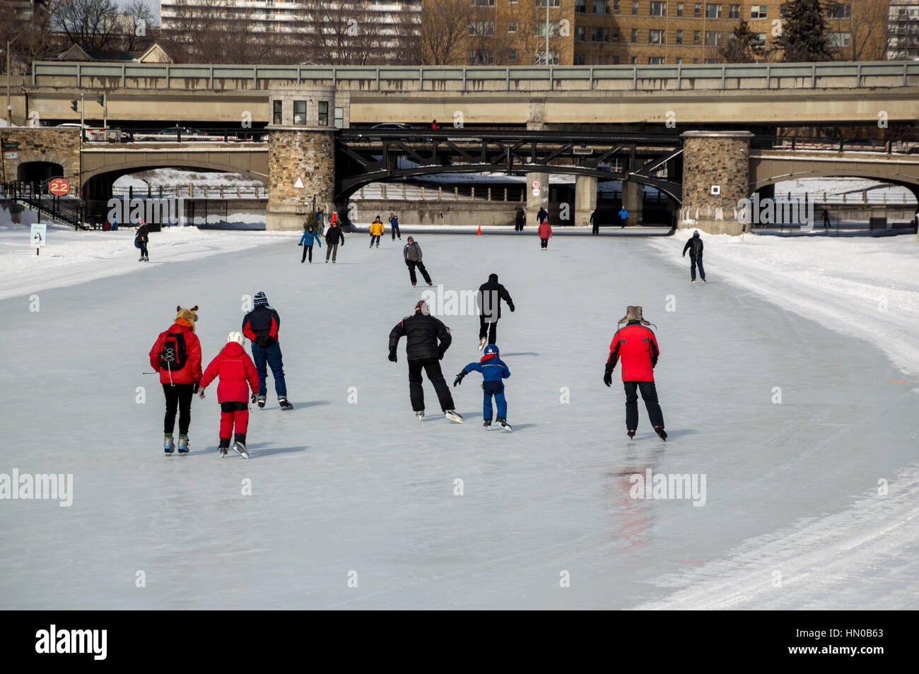 People ice skating on the Rideau Canal, Ottawa for Winterlude. Going