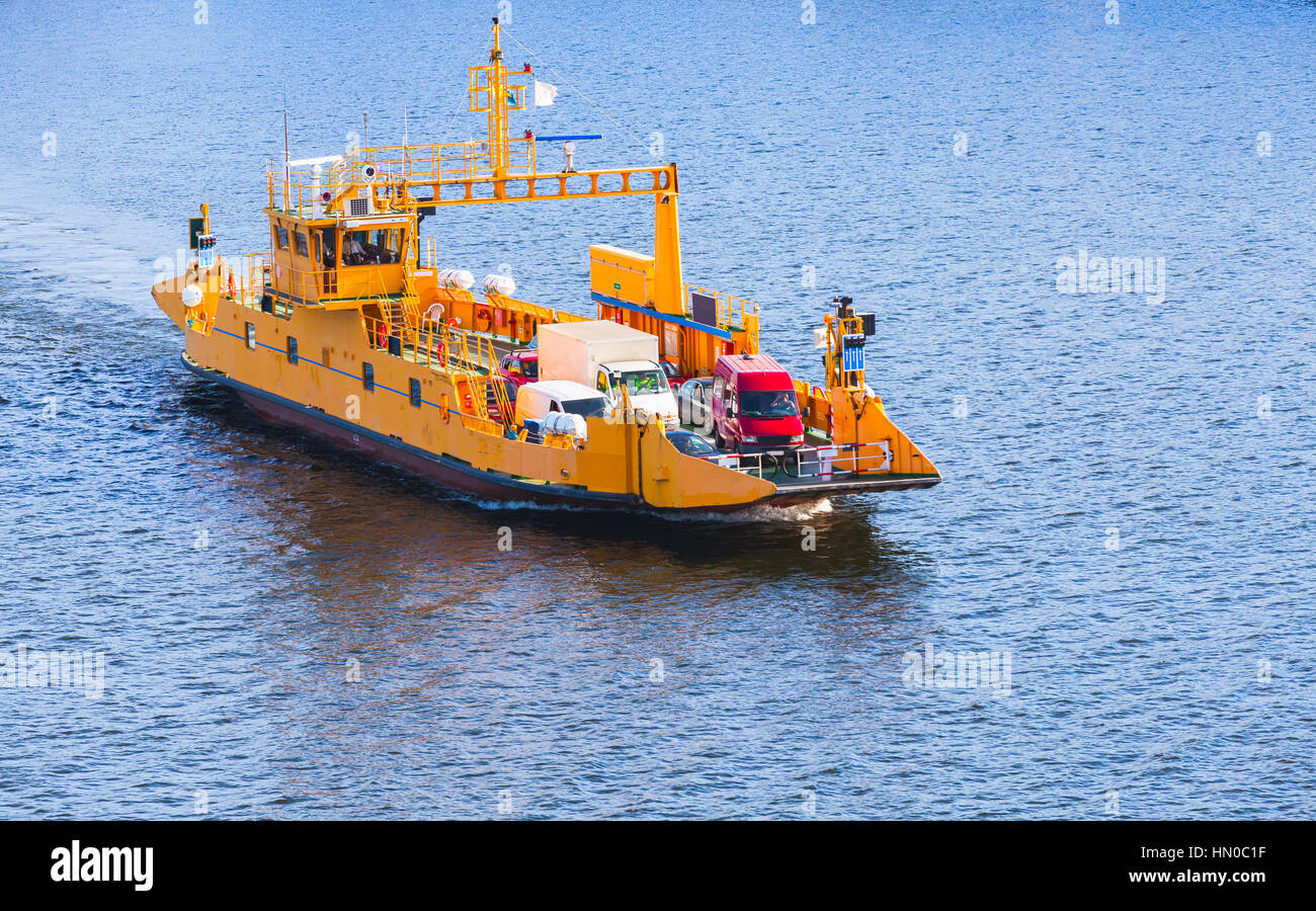 Yellow RoRo cargo ship goes on ferry route near Stockholm, Sweden